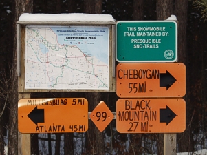 snowmobile trail 99 M-68 staging area Presque Isle Michigan snowmobiling